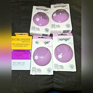 Real Techniques skin care sponge in purple plus an Eco Tools sponge.